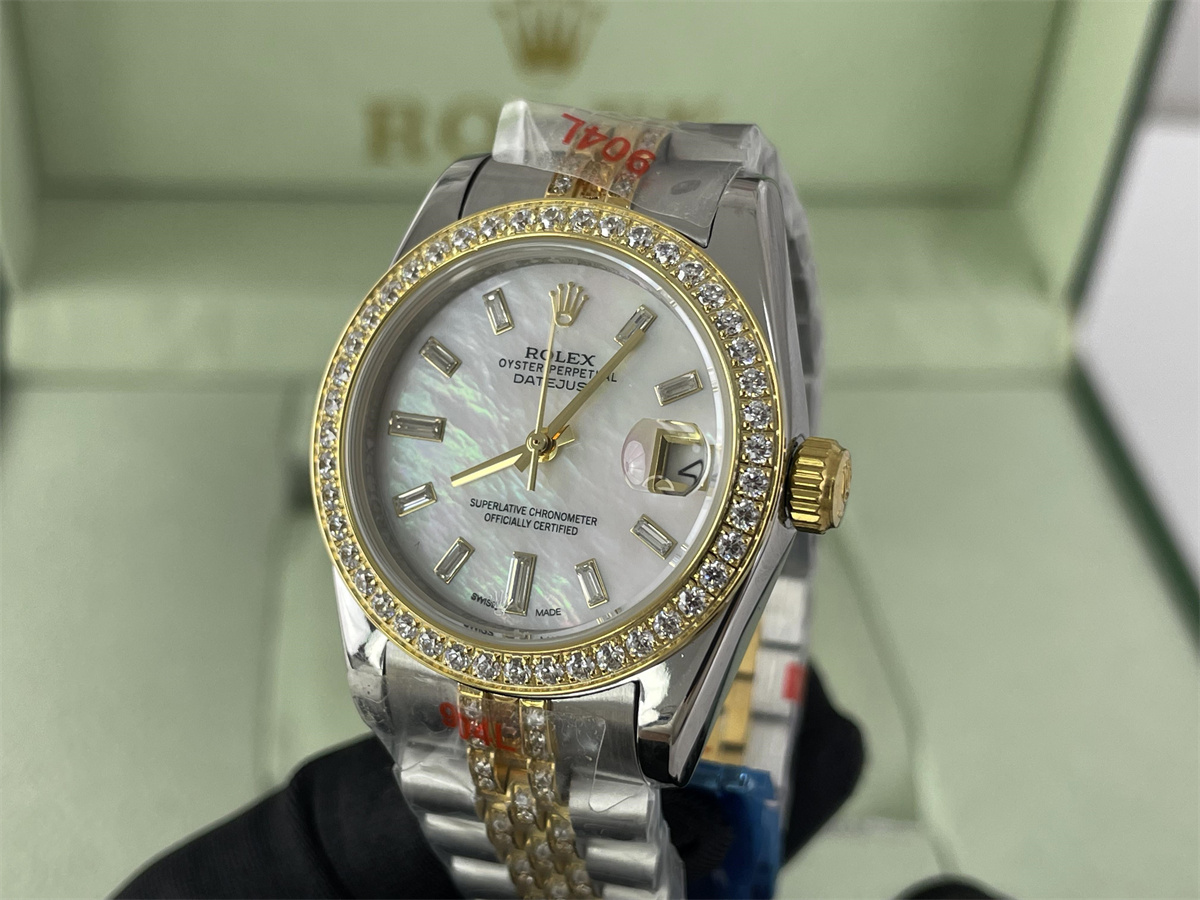 Rolex DATEJUST Lady's Yellow GOLD automatic watch with pearl dial plate & zircon stones, 26mm
