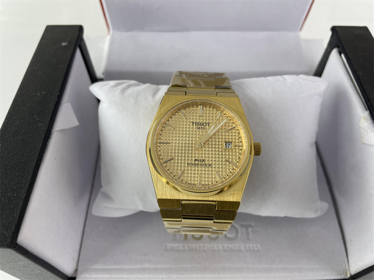 TISSOT Yellow GOLD PRX Automachine watch